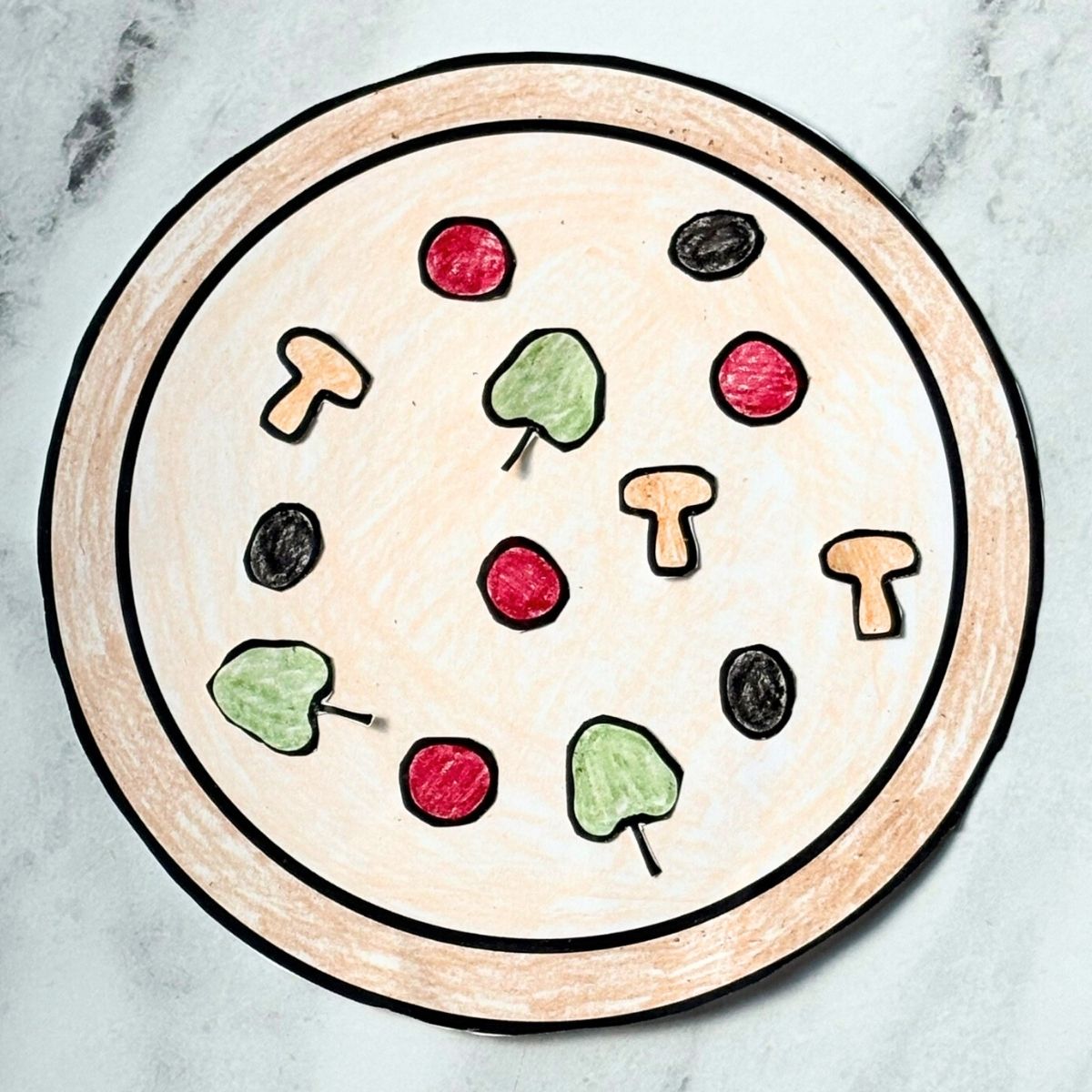 Printable pizza craft on a marble background.