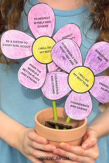 The Girl Scout Law Craft being held by a girl.