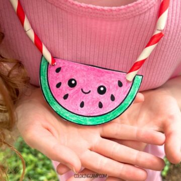 A child holding the summer necklace craft.
