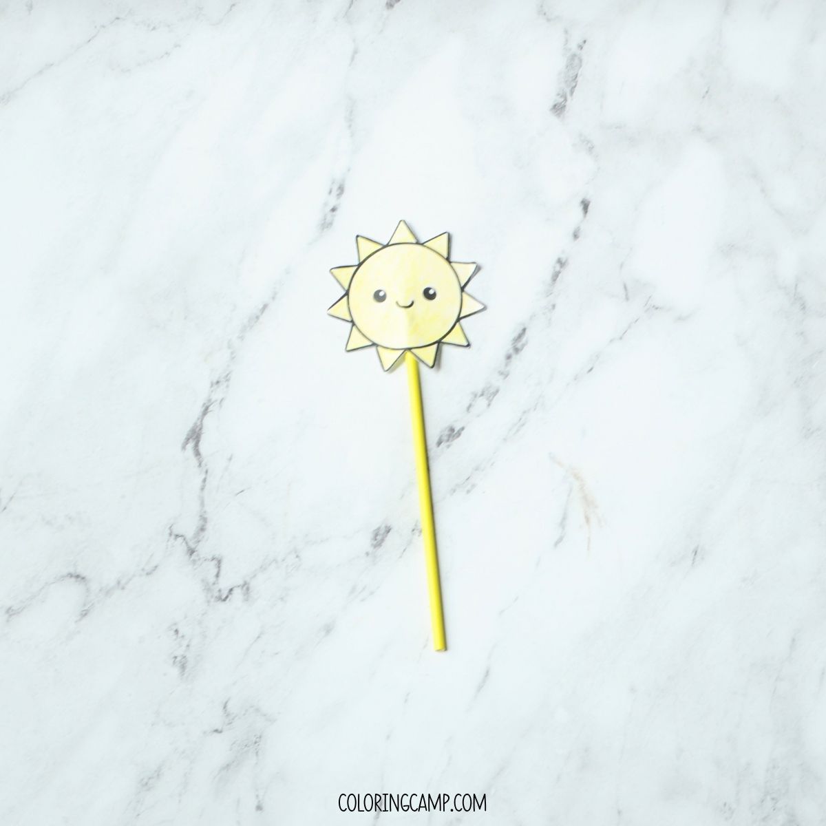 Step two of how to make a summer wand craft.