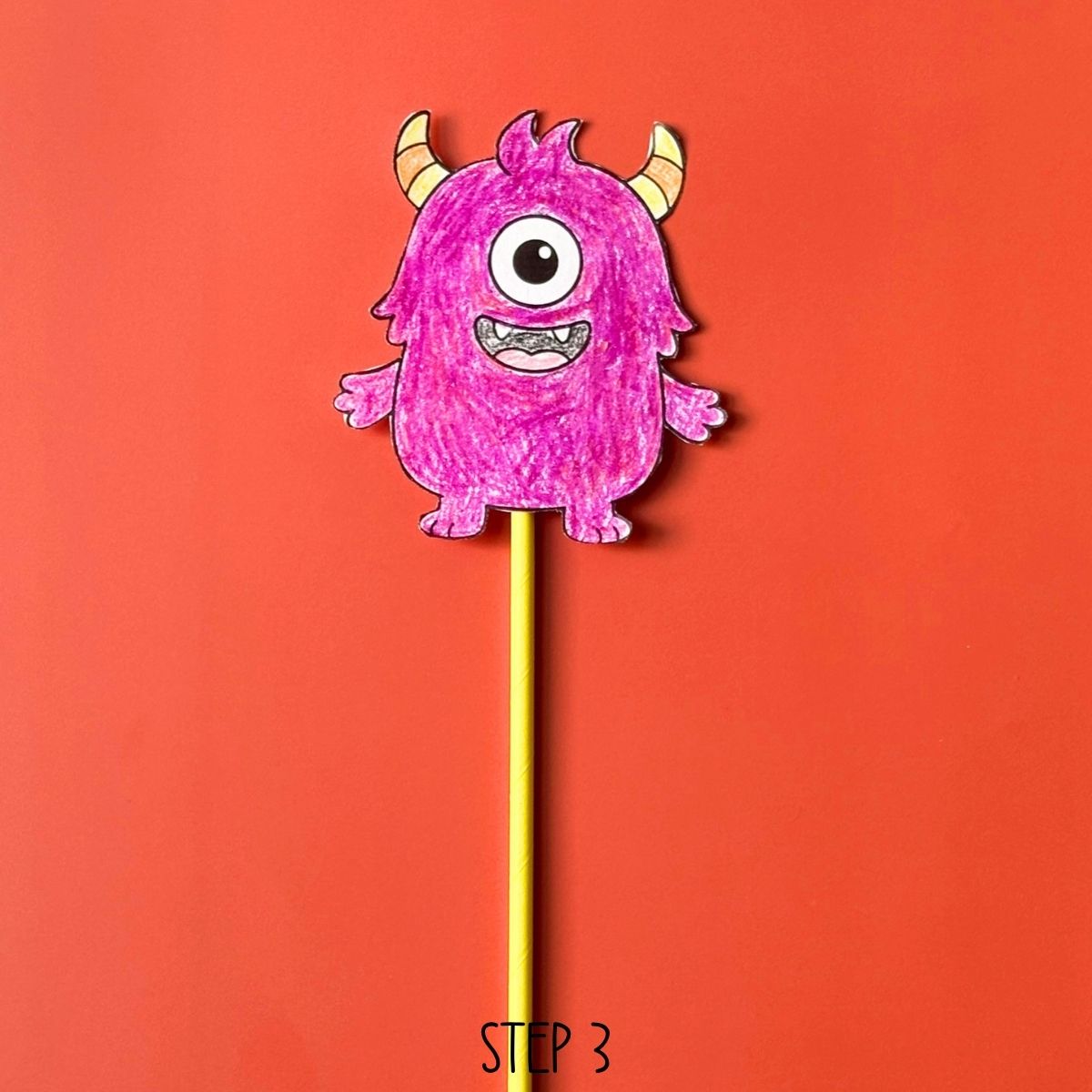 Step 3 of how to make the Halloween wand craft.