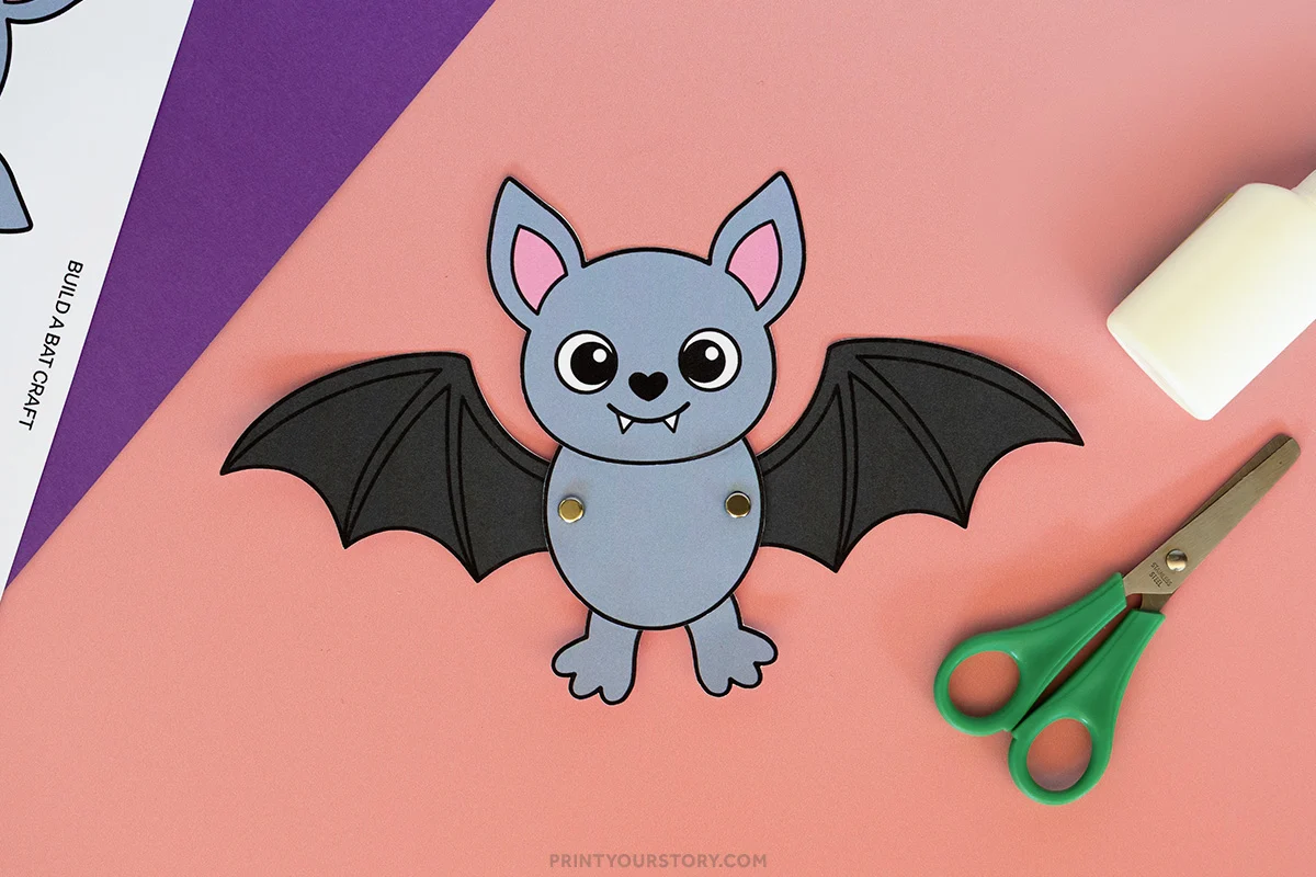 Flapping bat wing craft on a pink background.